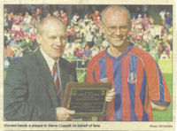Vincent Elphick presents Steve Coppell with a plaque